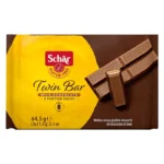Schär Twin Bar Milk Chocolate 64,5g, gaufrettes sans gluten enrobées de chocolat au lait en 3 portions individuelles.